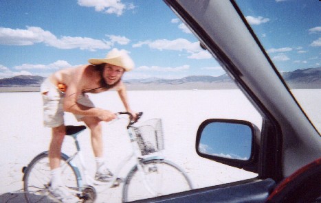 Crazed Desert Biker Swarms Motorbandit Armed With Cellphone Waterpistol